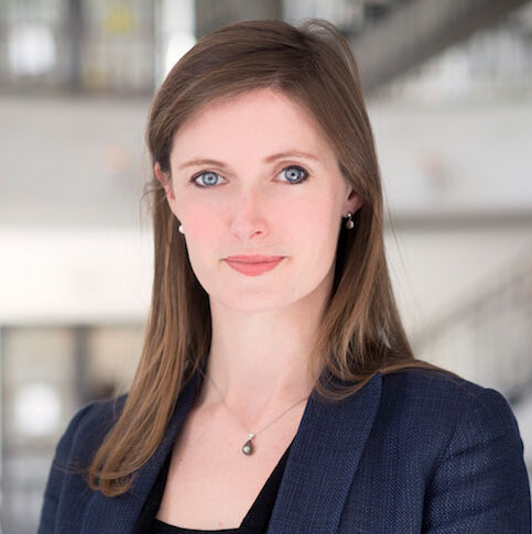 Gae Exton's daughter, Alexandra Exton Givens, in professional attire.