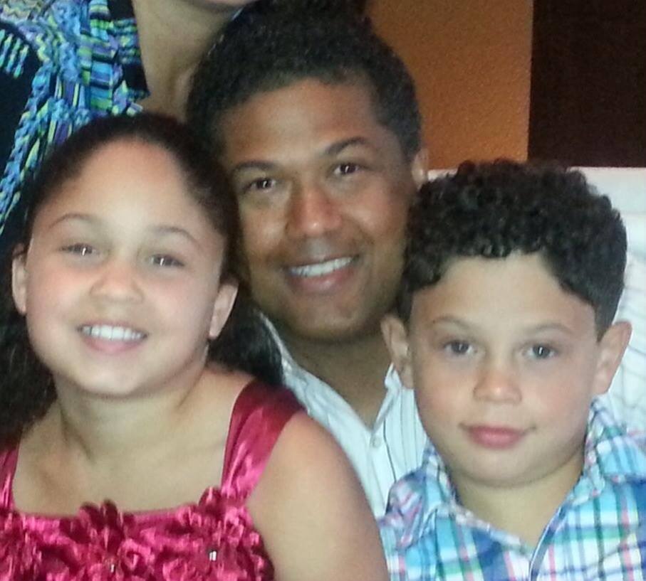 Kari Hillsman's husband Henry Francilion with her younger kids. 