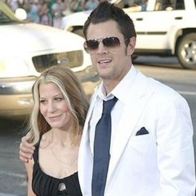 Picture of Melanie Lynn Clapp with her ex-husband Johnny Knoxville wearing black color gown