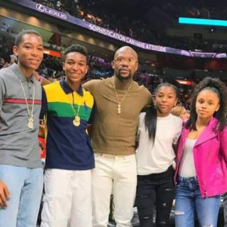 Devion Cromwell's siblings with their father.