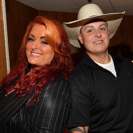 Grace Pauline Kelly's brother Elijah Judd and mother Wynonna Judd together.