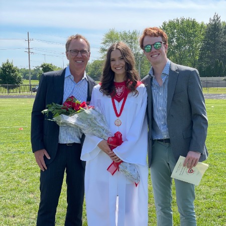 Eric Ferguson and Ethan Ferguson during Peyton Diane's high school graduation.